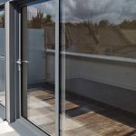 Grey aluminium sliding patio door