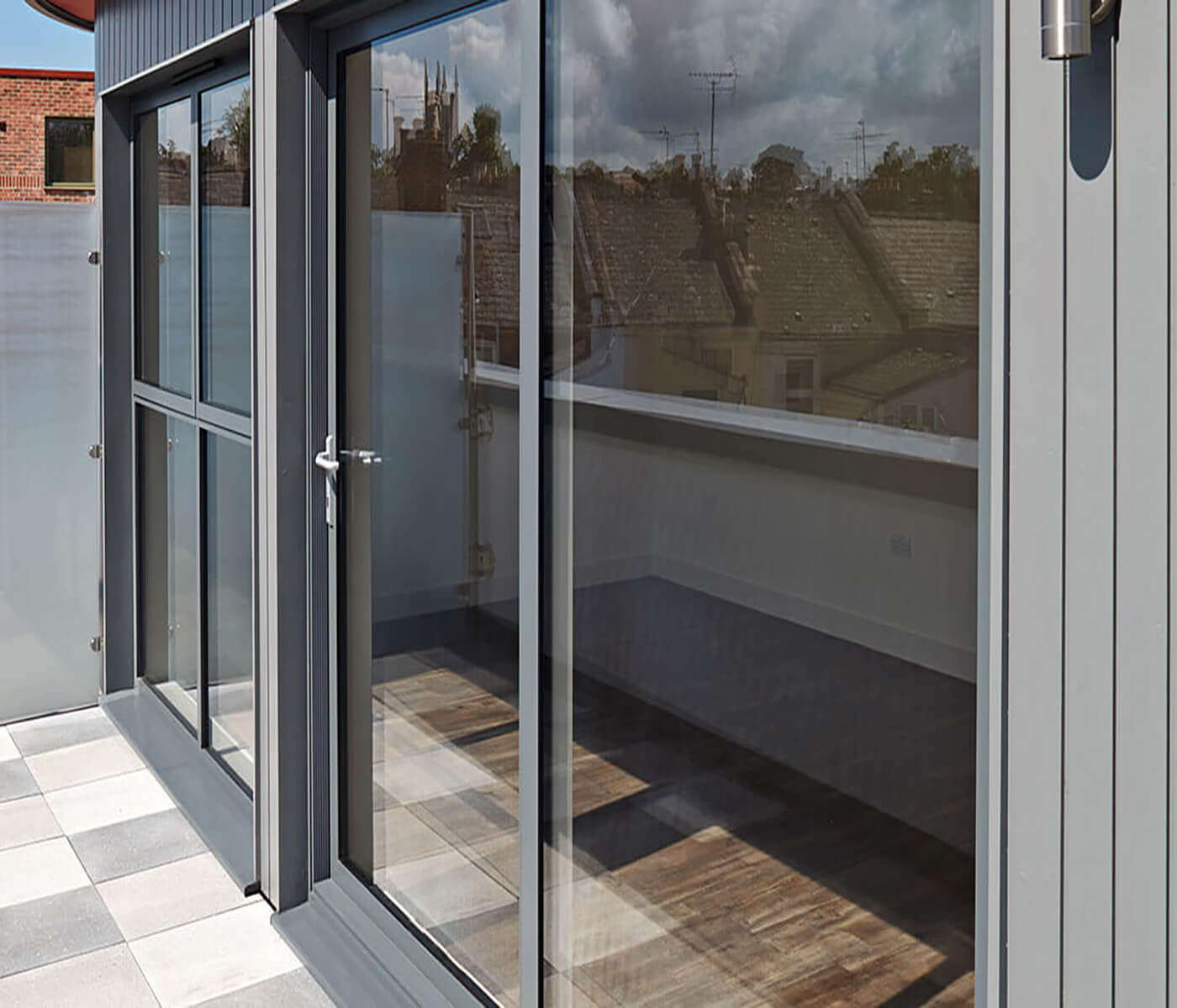 Grey aluminium sliding patio door