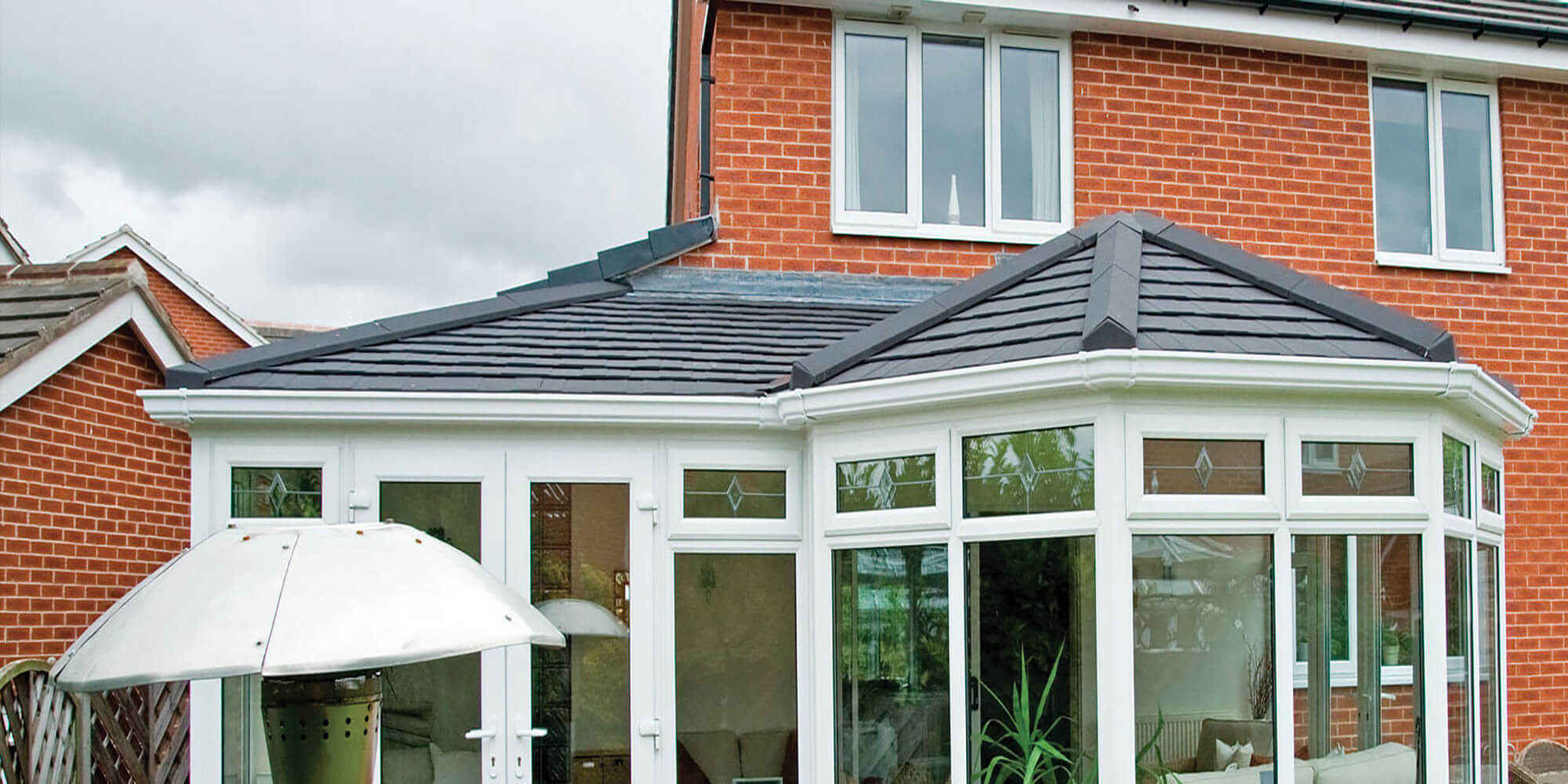 Grey tiled conservatory roof