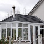 Tiled conservatory roof with chimney