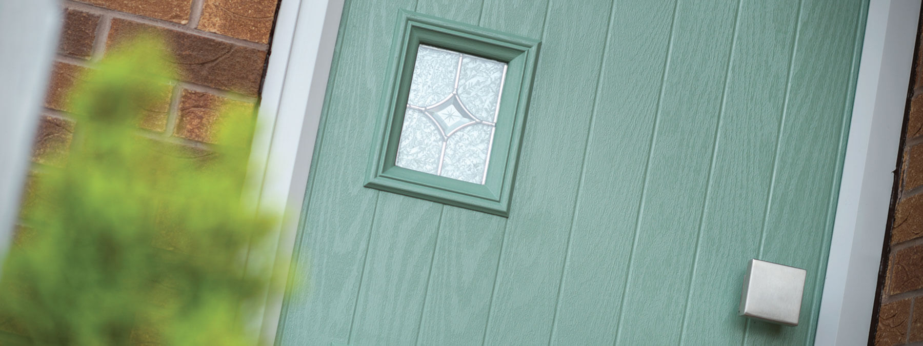 Close up of Chartwell Green composite doors bury Close up of Chartwell Green composite doors bury